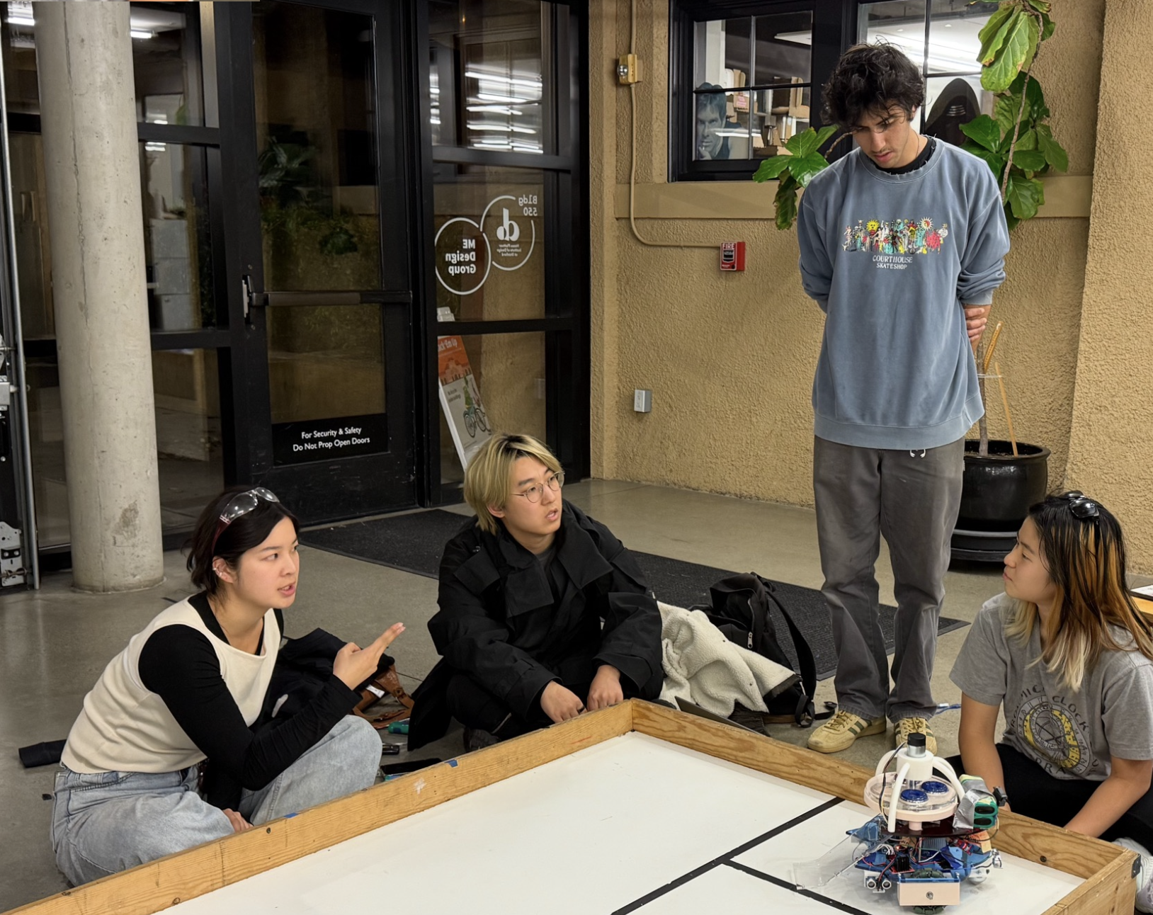 Team Pringle strategizing around the arena